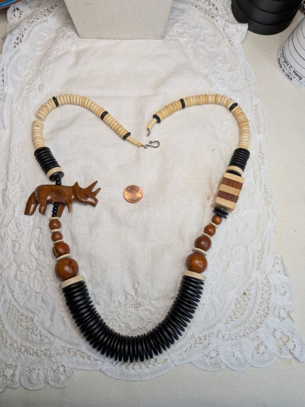 Vintage Hand‑Carved Rhino Pendant Necklace – Natural Beads 31"
